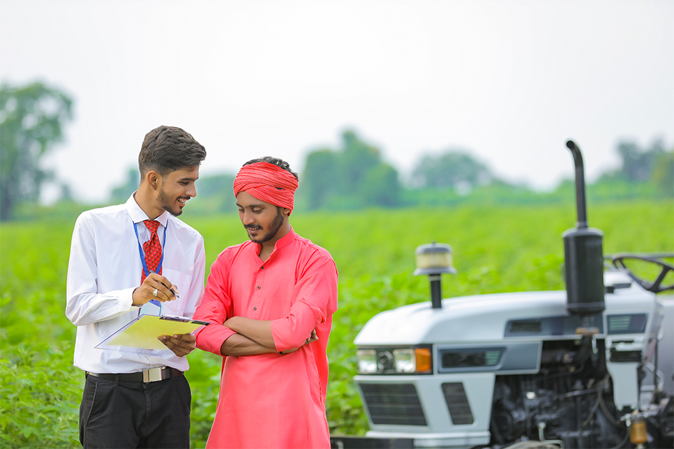 Loan Agent explaining Tractor Loan Benefits